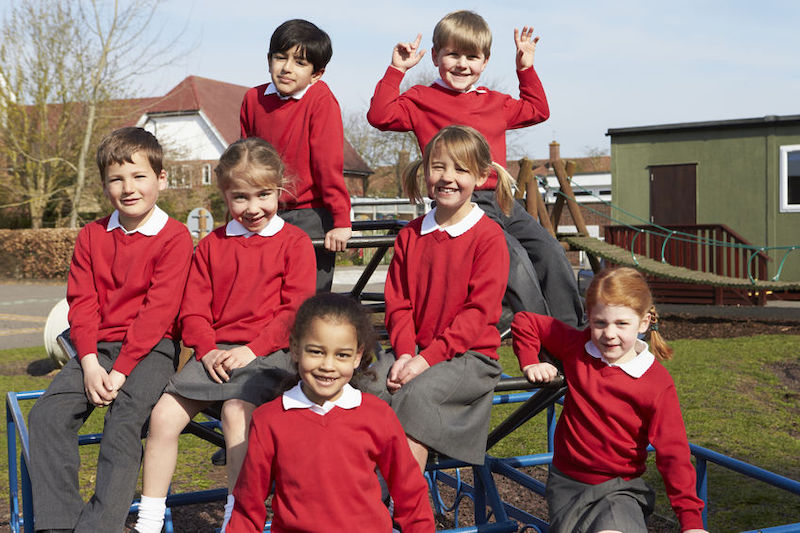 School promotional photography example of group shot outside with students in uniform
